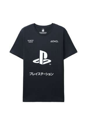 Maglietta nera in cotone con maniche corte. Presenta il logo PlayStation bianco e la scritta "SINCE 1994" sul davanti. Tessuto liscio, design casual.