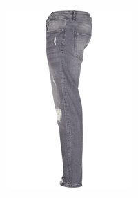 Grå denim jeans med slim fit, med slitte detaljer ved kneet, fire lommer og en standard midjebånd design.