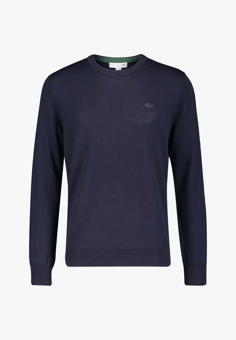 Dunkelblaues Strickpullover mit rundem Ausschnitt, gerippten Bündchen und Saum. Verfügt über ein kleines gesticktes Logo auf der Brust und einen grünen Innenkragen.