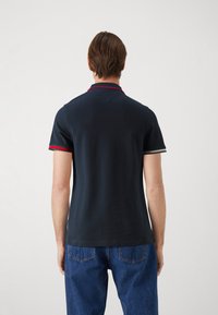 Tommy Jeans FLAG CUFFS - Polo shirt - dark night navy