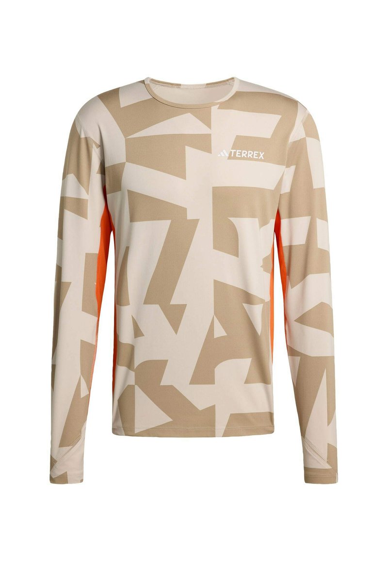 Camicia beige a maniche lunghe con motivi geometrici in tonalità più chiare e accenti arancioni. Realizzata in tessuto leggero, con scollatura arrotondata.