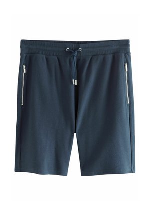 Shorts de sport bleu marine en tissu texturé, dotés d'une taille à cordon de serrage et de deux poches latérales zippées.