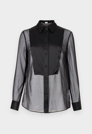 Black button-up shirt with a sheer front and solid black panels. Features a collared neck, long sleeves, and a smooth texture.