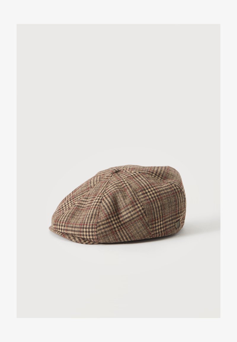 Καπέλο flat cap καρό σε καφέ και μπεζ χρώμα με μικρό υφασμάτινο κουμπί στην κορυφή, τοποθετημένο σε απλό λευκό φόντο.