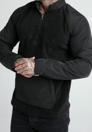 Suéter de forro polar - black