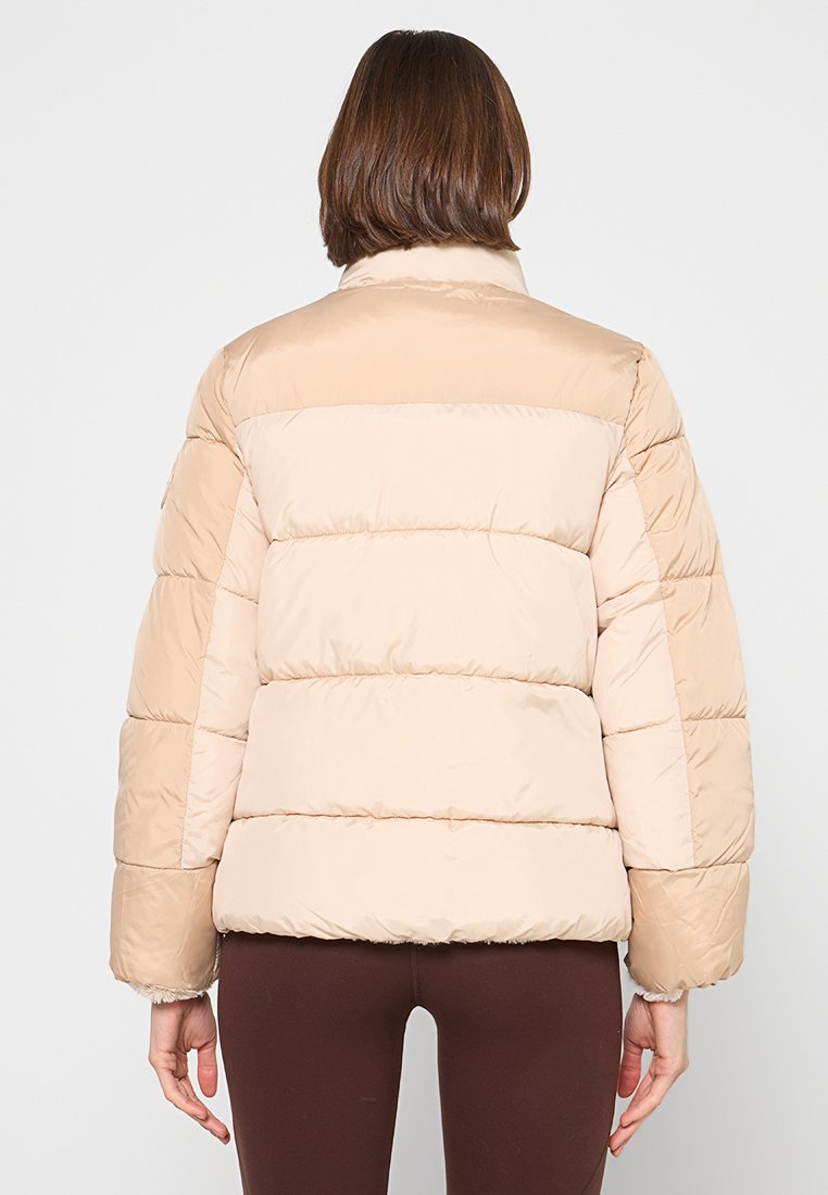 REVERSIBLE PUFFER