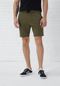 Pier One Pantalon de survêtement - olive