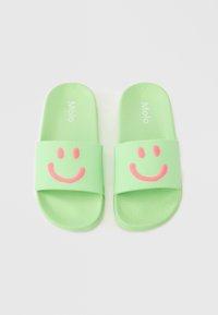 Green plastic slide sandals with a textured surface, featuring a large pink smiley face on each strap and "Molo" printed in white.