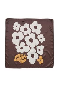 Brun silkeslørf med store hvide blomster i forskellige størrelser og en stiliseret tekst i orange, der læser "ANOTHER COTTON" nederst.