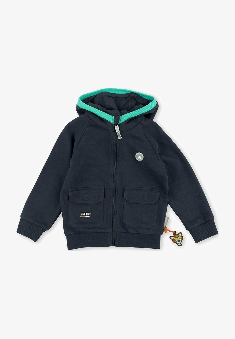 Haut de survêtement zippé bleu marine pour enfants avec capuche doublée turquoise, deux poches avant, logo Safari Adventure et porte-clés guépard attaché à la poche.