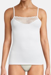 White camisole top with adjustable spaghetti straps, featuring a lace neckline detail and a smooth, stretchy cotton fabric.