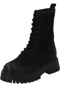 Stivaletto in suede nero con suola spessa e robusta, design stringato e linguetta. Presenta un materiale testurizzato e un dettaglio del logo minimalista.