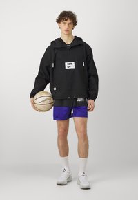 Nike Performance NBA BROOKLYN NETS ANORAK - Vereinsmannschaften - black/white