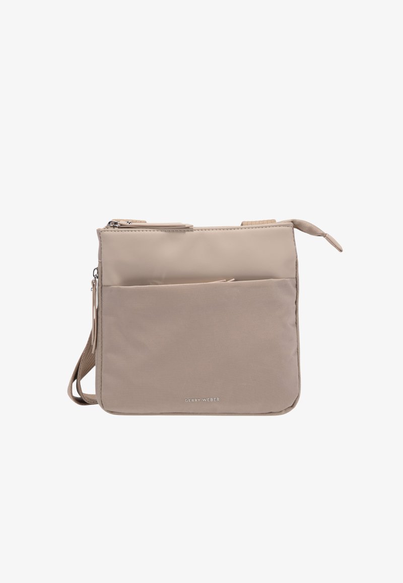 Sac bandoulière beige en nylon doux avec une texture lisse, comprenant un compartiment principal zippé et une poche avant, une sangle réglable et un logo.