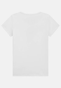 T-shirt blanc à manches courtes avec un col rond et une texture lisse et unie. Pas de motifs ni d'accent visibles.