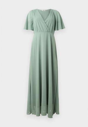 Maxi dress in light green, made from lightweight fabric. Features a v-neck, short flutter sleeves, and a flowing silhouette.