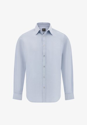 Gai zils garām piedurknēm krekls ar pogājamu priekšpusi, norādītu apkakli, izliekta apakšmalu un gludu tekstūru. Ievērojamas sešas saskaņotas pogas.