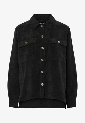 Czarna koszula z sztruksu z długimi rękawami, zapinana na guziki, z dwoma przednimi kieszeniami na piersi zapinanymi na klapki z guzikami oraz ostrym kołnierzem.