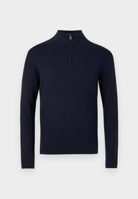 Pull-over bleu marine avec un col montant et une fermeture éclair d'un quart, en tissu tricoté lisse, doté de manches longues et d'un ourlet inférieur ajusté.