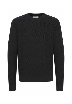 Crna majica sa teksturiranim zigzag uzorkom, okruglim izrezom i dugim rukavima. Izrađena je od pletene tkanine za udoban fit.