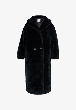 Abrigo negro de corte largo, fabricado en un material suave y aterciopelado. Presenta un cuello con muescas, botones dobles y mangas anchas. Textura suave y uniforme.