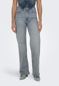ONLJUICY WIDE DOT - Wide leg - light blue denim detail tint