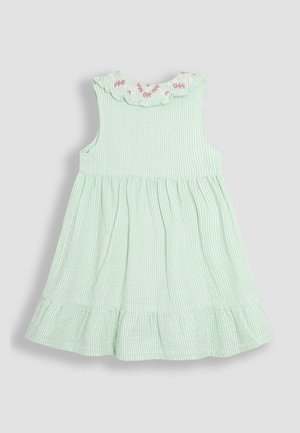 Abito senza maniche a righe verdi e bianche con colletto a volant, ricami floreali e gonna svasata con texture arricciata.