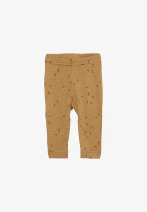 Senf-farbene Leggings mit weicher Textur, die mit einem dezenten braunen Muster aus kleinen Schleifen durchzogen sind. Mit elastischem Taillenbund und lässiger Passform.