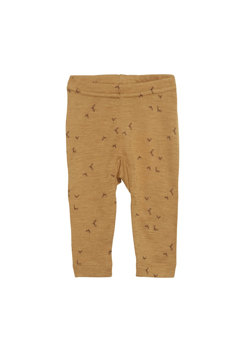 Mosterdkleurige leggings met een zachte textuur, voorzien van een subtiel bruin patroon van kleine strikken overal. Elastische tailleband, casual fit.