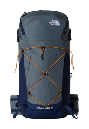 Dark blue and gray The North Face Trail Lite 24 backpack with orange bungee cord on front and padded waist straps.