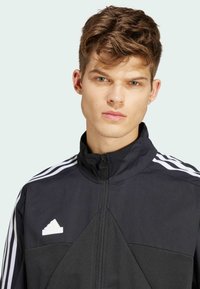 adidas Sportswear MATERIAL MIX TRACK - Trainingsjacke - black