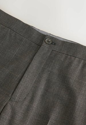 Graue strukturierte Hose mit einem dezenten Karomuster, einer flachen Vorderseite und einem Knopfverschluß am Bund.