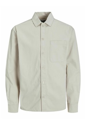 Helles beige Langarmhemd aus Baumwolle. Verfügt über einen klassischen Kragen, eine durchgehende Knopfleiste und eine Brusttasche auf der linken Seite.