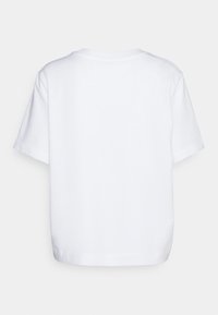 T-shirt blanc uni à manches courtes avec un col rond, vu de dos sur fond blanc.