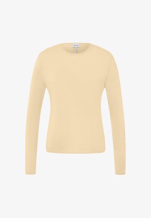 Beżowy sweter z długim rękawem i okrągłym dekoltem o slim fit, wykonany z tkanej tkaniny z fakturą, z małą metką marki na kołnierzu.