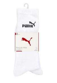 Weiße Baumwollcrew-Socken im Dreierpack, mit geripptem Muster und einem schwarzen Puma-Logo am Bündchen. Gepolsterte Sohle.