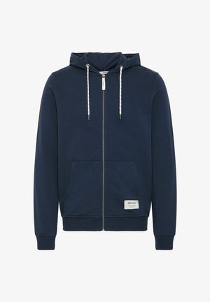 Navy blue zip-up hoodie made of soft fabric, featuring a drawstring hood, two front pockets, and a logo patch near the hem.