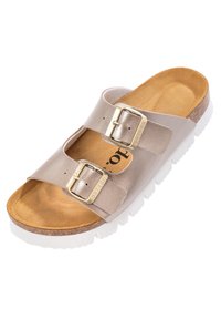 Infradito beige chiaro con due cinturini regolabili, fibbie in metallo e una soletta in sughero texturizzato su una suola in gomma bianca.