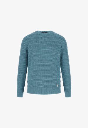 Sinine kootud sviiter tekstuuriga mustriga, ümmarguse kaelusega ja soonikkatete äärtega. Küljes on väike kolmnurkne logo.