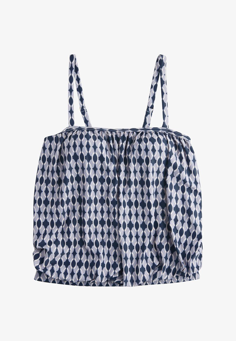 Modrý tmavomodrý top bez rukávov s bielym geometrickým vzorom reťazových očiek a tenkými ramienkami, voľný strih s miernym nariasením v spodnej časti.