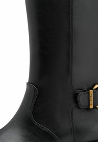 Black leather knee-high boot featuring a smooth texture, curved design, and a gold-tone buckle accent with embossed branding.