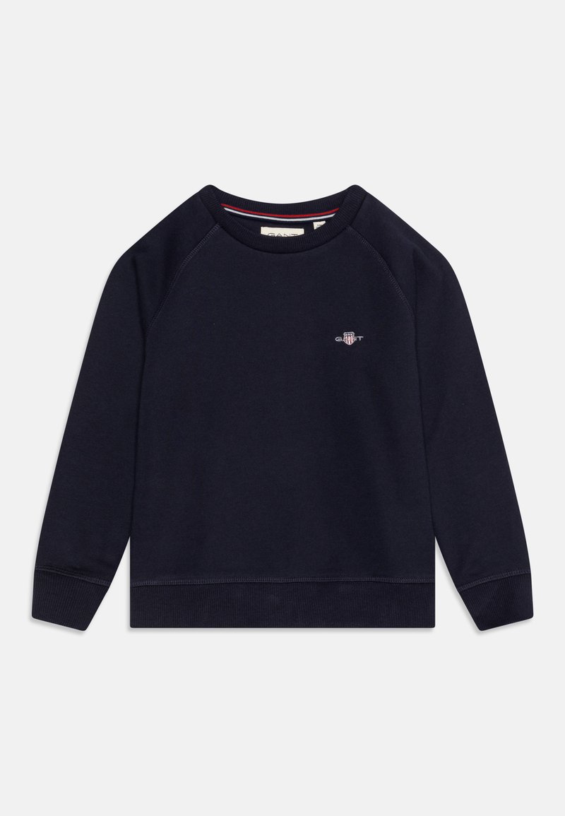 Sudadera azul marino con cuello redondo, mangas raglán y puños acanalados. Presenta un pequeño logo en el pecho y una textura suave.