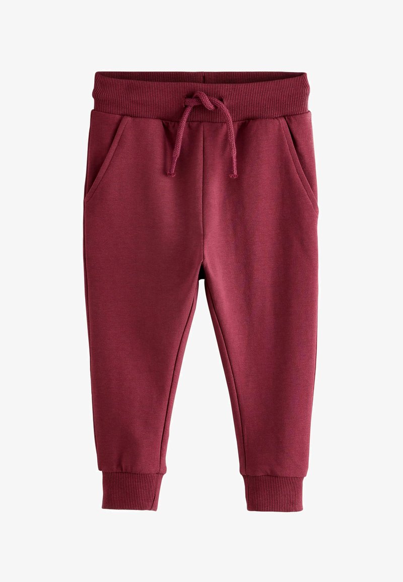 Pantaloni jogger color borgogna realizzati in tessuto morbido, con vita elasticizzata, cordino e tasche laterali. Polsini a costine alle caviglie.