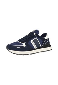 Navy blue sneaker made of suede and mesh, featuring white accents, lace-up closure, and a textured rubber sole with a zigzag pattern.