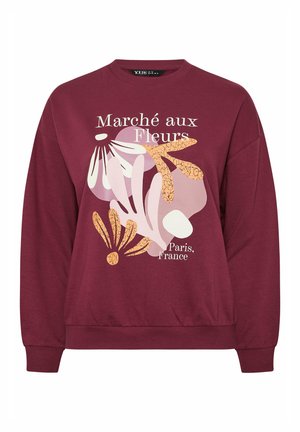 Burgunderrød sweatshirt med abstrakt blomsterdesign og tekst "Marché aux Fleurs Paris, Frankrig" i hvide, pink og orange toner.