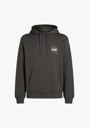 Tumši pelēks kapuce ar kabatu, auklām un izšūtu grafiku ar personu saulesbrillēs uz krūtīm. Mīksta auduma tekstūra.