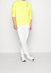 Nike Sportswear Sweatshirt - yellow
