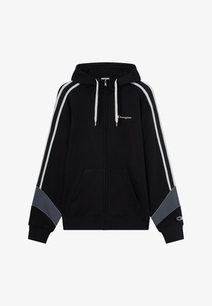 Sudadera negra con cremallera, franjas laterales en blanco y gris, capucha con cordón, bolsillos frontales y logo bordado en el pecho. Tejido de algodón.