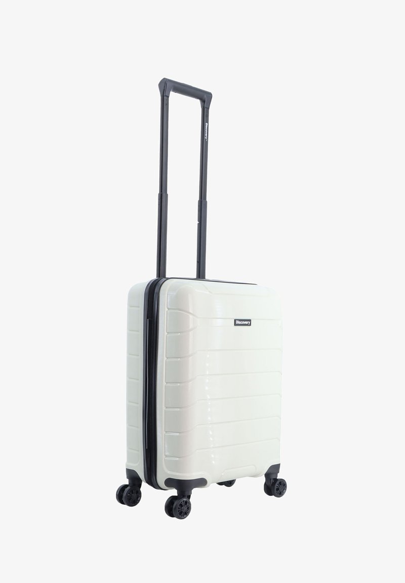 Hard-shell white suitcase with a ribbed texture, retractable black handle, and four wheels. Features a zipper and a logo on the front.