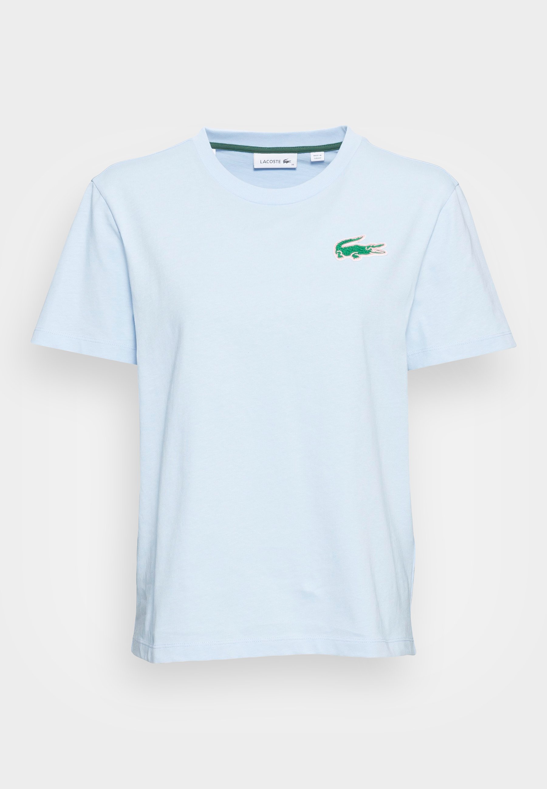 camiseta lacoste azul claro